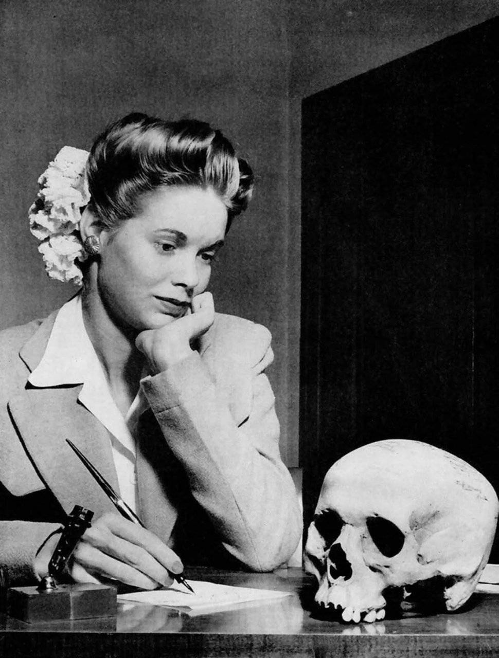 A woman writing a thank you note to her boyfriend in the Navy for the skull of a Japanese soldier that he sent her, 1944.