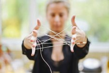 omans-hands-connected-With-Tangled-String-1024x684.jpg