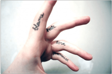words-or-names-on-inner-finger-tattoos.png