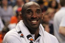Kobe_Bryant_smiling_on_the_bench_USA_vs_GBR_2012.jpg